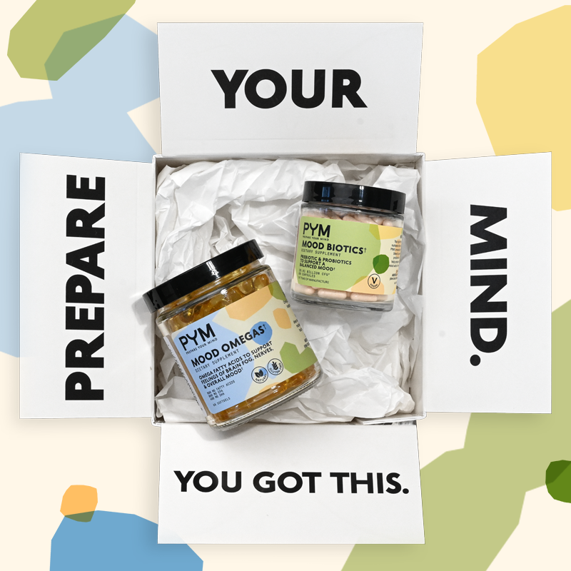 Open box with two jars of PYM supplements labeled 'Mood Omega3' and 'Mood Biotics'. Box flaps read: 'PREPARE YOUR MIND. YOU GOT THIS.'